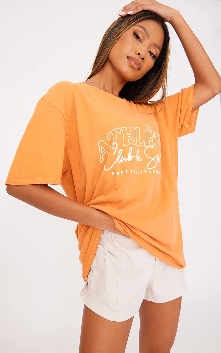 PRETTYLITTLETHING Orange Washed Athlete Print T Shirt