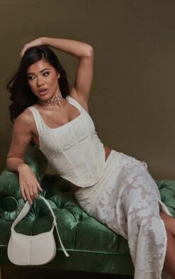 Cream Floral Applique Dip Hem Corset Top